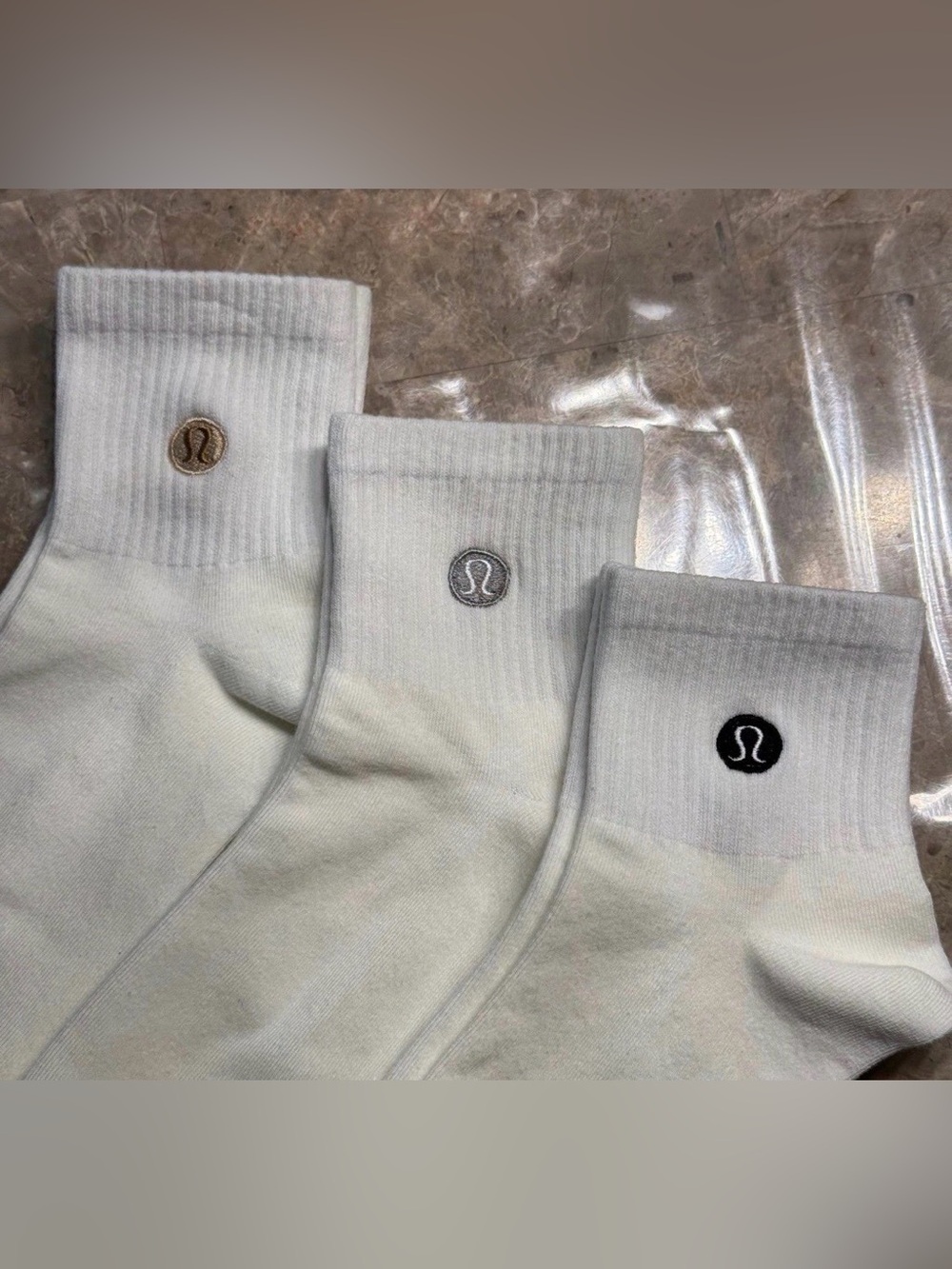 New Women’s Lululemon Athletica short Sock
Size Medium
Very light cream color